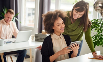 two-women-looking-at-ipad_13